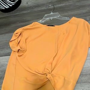 yellow sleek top